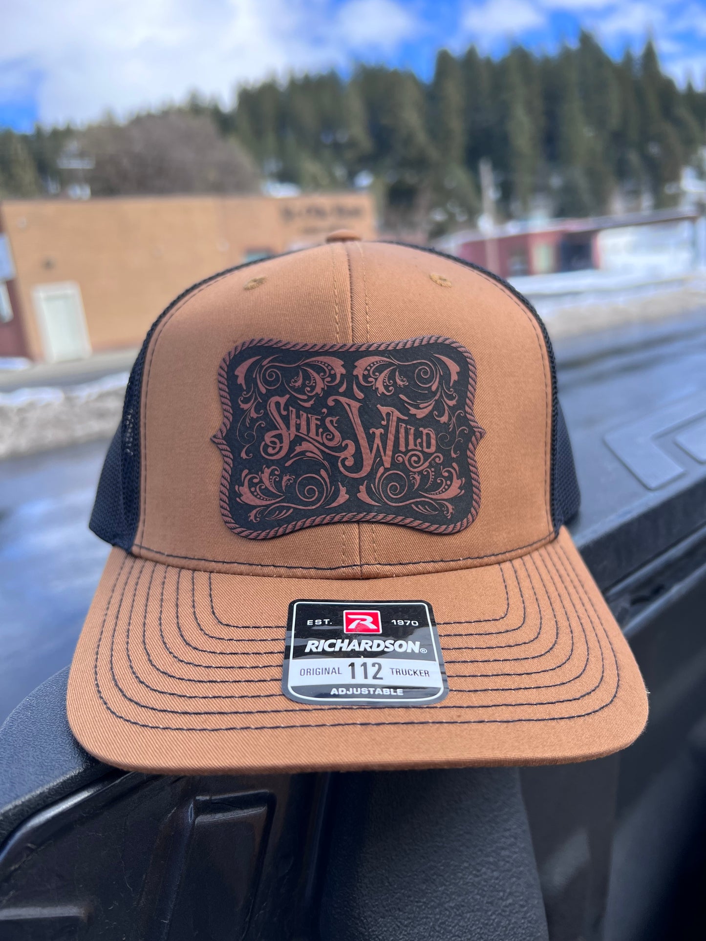 She's Wild Buckle Cap