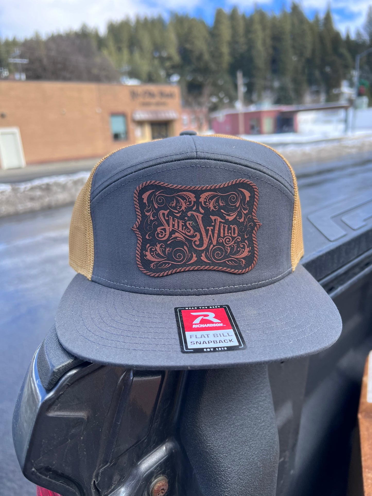 She's Wild Buckle Cap