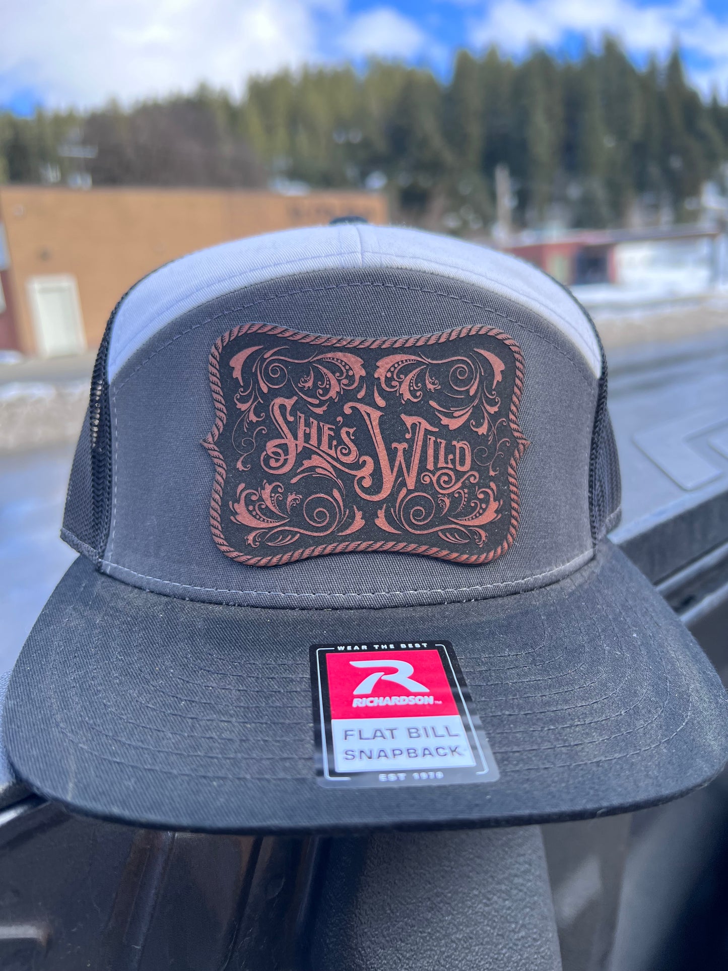 She's Wild Buckle Cap